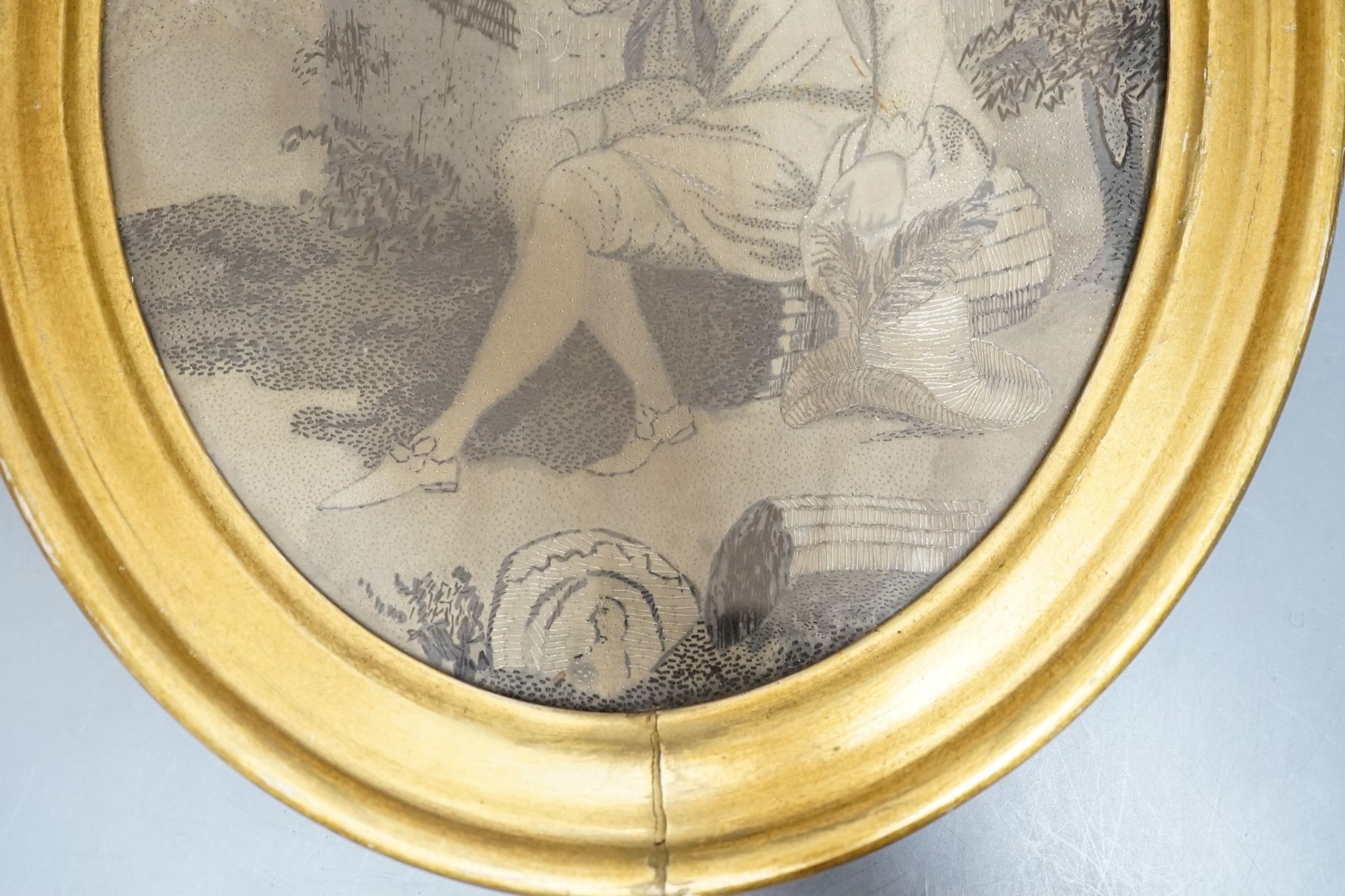A pair of early 19th century silkwork panels